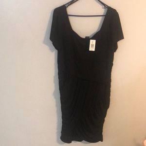 Black ribbed fitted dress.